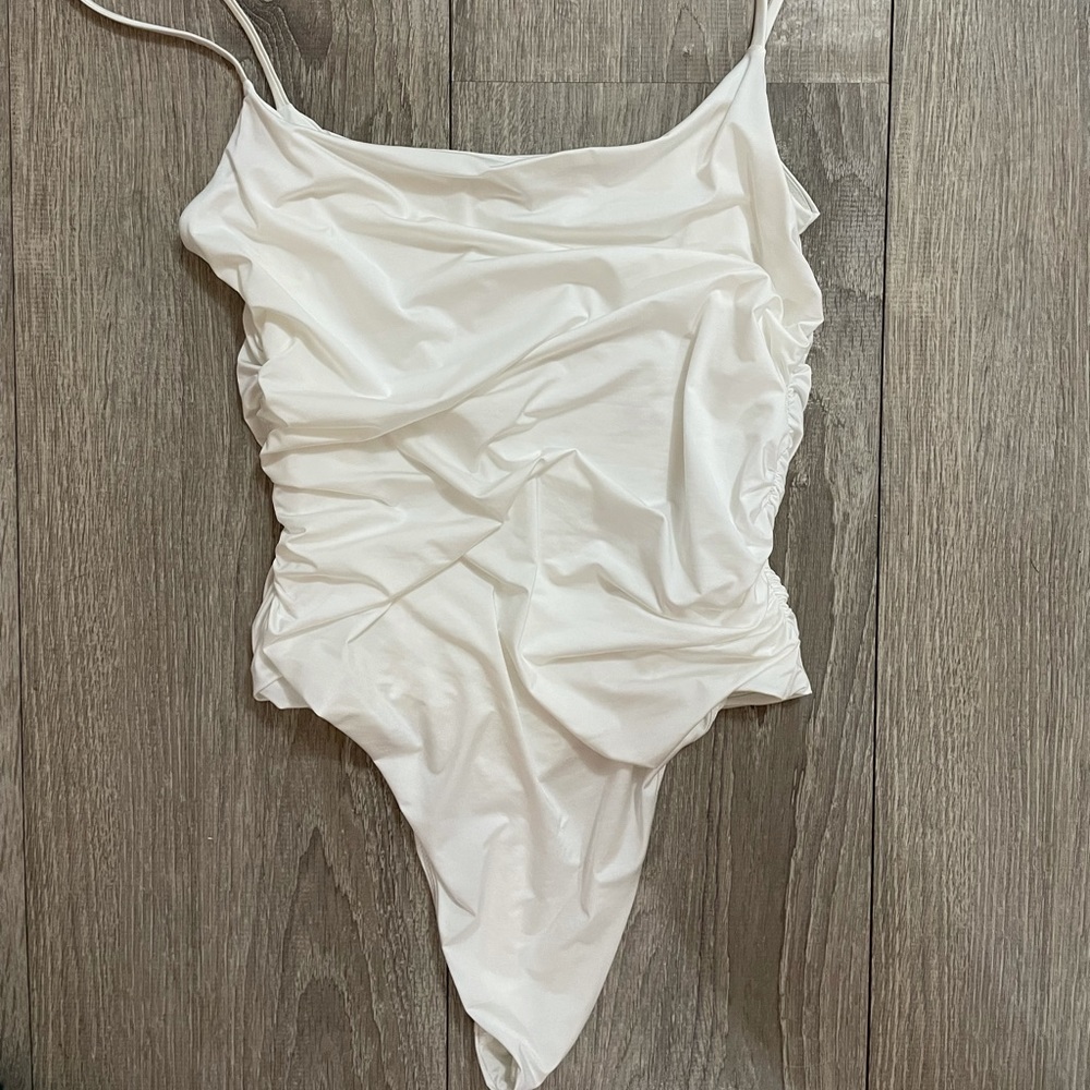 Sinched body suit